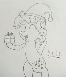 Size: 750x878 | Tagged: safe, artist:herorareheart, pinkie pie, earth pony, pony, g4, anatomically incorrect, christmas, cutie mark, female, hat, holiday, hoof hold, mare, monochrome, present, santa hat, signature, simple background, sketch, traditional art