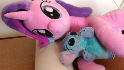 Size: 2048x1152 | Tagged: safe, artist:nekokevin, starlight glimmer, alien, pony, unicorn, g4, hug, irl, lilo and stitch, lying down, on side, photo, plushie, stitch