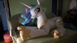 Size: 4608x2592 | Tagged: safe, artist:arniemkii, princess celestia, alicorn, horse, pony, unicorn, g4, bootleg, couch, female, hongyi, inflatable, inflatable toy, inflation, irl, lying down, mare, photo, prone, resting