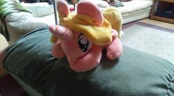 Size: 960x528 | Tagged: artist needed, safe, oc, oc only, oc:peach bloom, pony, unicorn, irl, photo, plushie, solo