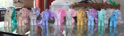 Size: 900x264 | Tagged: safe, artist:faerie-starv, blossom, blue belle, butterscotch (g1), cotton candy (g1), dream blue, gusty, minty (g1), peachy, snuzzle, g1, g3, collection, irl, photo, square crossover, toy, watermark