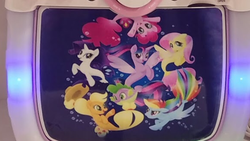 Size: 1136x640 | Tagged: safe, applejack, fluttershy, pinkie pie, rainbow dash, rarity, spike, twilight sparkle, alicorn, earth pony, merpony, pegasus, pony, puffer fish, seapony (g4), unicorn, g4, my little pony: the movie, official, bubble, dorsal fin, female, fin, fin wings, fins, flowing mane, flowing tail, irl, karaoke, mane six, mare, merchandise, open mouth, open smile, photo, seaponified, seapony applejack, seapony fluttershy, seapony pinkie pie, seapony rainbow dash, seapony rarity, seapony twilight, smiling, species swap, spike the pufferfish, swimming, tail, that pony sure does love being a seapony, twilight sparkle (alicorn), underwater, water, wings