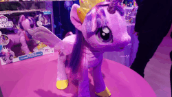 Size: 512x288 | Tagged: safe, twilight sparkle, alicorn, human, pony, robot, g4, adoracreepy, animated, creepy, cute, gif, irl, irl human, petting, photo, robotwi, toy, toy fair, toy fair 2017, twiabetes, twilight sparkle (alicorn), what has science done, youtube link