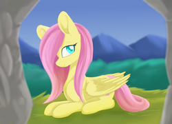 Size: 798x576 | Tagged: safe, artist:dusthiel, fluttershy, g4, colored pupils, female, grass, hair over one eye, looking at you, looking sideways, mountain, profile, prone, smiling, solo