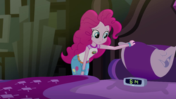 Size: 1280x720 | Tagged: safe, screencap, pinkie pie, equestria girls, g4, my little pony equestria girls: legend of everfree, alarm clock, bed, bedroom, bracelet, clock, clothes, female, jewelry, leaning, pillow, shorts, solo
