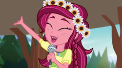 Size: 1280x720 | Tagged: safe, screencap, gloriosa daisy, equestria girls, g4, my little pony equestria girls: legend of everfree, cute, daisybetes, female, flower, happy, magical geodes, microphone, solo