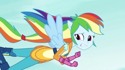 Size: 1920x1080 | Tagged: safe, screencap, rainbow dash, equestria girls, g4, my little pony equestria girls: friendship games, female, flying, motocross outfit, ponied up, solo, wings