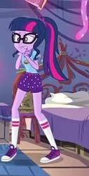 Size: 154x302 | Tagged: safe, screencap, sci-twi, twilight sparkle, equestria girls, g4, my little pony equestria girls: legend of everfree, camp everfree outfits, clothes, converse, cropped, female, glasses, scared, shoes, shorts, socks, solo