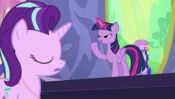 Size: 1280x720 | Tagged: safe, screencap, starlight glimmer, twilight sparkle, alicorn, pony, unicorn, celestial advice, g4, animation error, equestrian pink heart of courage, eyes closed, glowing horn, horn, lidded eyes, magic, open mouth, raised hoof, smiling, twilight sparkle (alicorn), twilight's castle