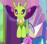 Size: 164x154 | Tagged: safe, screencap, lokiax, party favor, changedling, changeling, pony, celestial advice, g4, background changeling, cute, cuteling, flying, horn, offscreen character, picture for breezies, smiling, solo focus, twilight's castle, wings