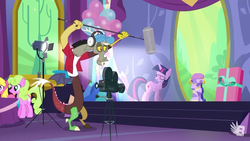 Size: 854x480 | Tagged: safe, screencap, cherry berry, daisy, discord, flower wishes, twilight sparkle, alicorn, earth pony, pony, celestial advice, g4, balloon, cap, clothes, film camera, gift wrapped, hat, headphones, horn, microphone, spotlight, twilight sparkle (alicorn), twilight's castle, wings