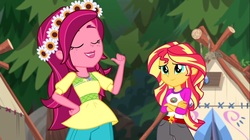 Size: 1100x618 | Tagged: safe, screencap, gloriosa daisy, sunset shimmer, equestria girls, g4, my little pony equestria girls: legend of everfree, biting, cute, tongue bite