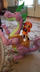 Size: 1152x2048 | Tagged: safe, spike, sunset shimmer, equestria girls, g4, adult, adult spike, doll, equestria girls minis, eqventures of the minis, guardians of harmony, irl, older, older spike, photo, spear, spikezilla, toy, weapon
