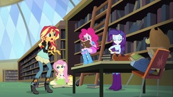 Size: 1100x618 | Tagged: safe, screencap, angel bunny, applejack, fluttershy, pinkie pie, rarity, sunset shimmer, equestria girls, g4, my little pony equestria girls: friendship games, arm behind head, backpack, book, boots, bracelet, chair, clothes, cowboy boots, high heel boots, jacket, jewelry, ladder, leather jacket, library, mirror, skirt, table