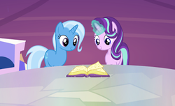 Size: 338x206 | Tagged: safe, screencap, starlight glimmer, trixie, pony, unicorn, all bottled up, g4, book, cropped, cutie map, duo, looking at something, magic, smiling, twilight's castle