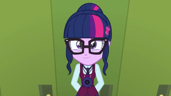 Size: 854x480 | Tagged: safe, screencap, sci-twi, twilight sparkle, equestria girls, g4, my little pony equestria girls: friendship games, clothes, crystal prep academy uniform, glasses, hands behind back, looking at you, magic capture device, school uniform, smiling