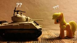 Size: 2048x1152 | Tagged: safe, applejack, g4, female, hatless, irl, m4 sherman, missing accessory, photo, puzzled, solo, tank (vehicle), toy