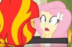 Size: 664x432 | Tagged: safe, screencap, fluttershy, sunset shimmer, equestria girls, g4, my little pony equestria girls, bully, bullying, female, lockers, open mouth, rear view