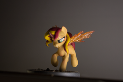 Size: 1000x667 | Tagged: safe, artist:alisterosenheim, sunset shimmer, pony, g4, craft, female, fiery shimmer, fiery wings, frown, sculpture, solo, sunset phoenix, traditional art