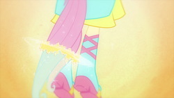 Size: 1539x866 | Tagged: safe, screencap, fluttershy, equestria girls, g4, my little pony equestria girls, boots, fall formal outfits, high heel boots, ponied up, ponytail, solo, sparkles, transformation, transformation sequence