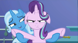 Size: 911x511 | Tagged: safe, screencap, starlight glimmer, trixie, pony, all bottled up, g4, annoyed, floppy ears, trixie's puppeteering