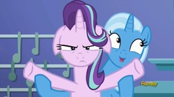 Size: 1659x920 | Tagged: safe, screencap, starlight glimmer, trixie, pony, all bottled up, g4, annoyed, floppy ears, trixie's puppeteering
