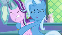 Size: 1920x1080 | Tagged: safe, screencap, starlight glimmer, trixie, pony, unicorn, all bottled up, g4, bipedal, female, hug, icing bag, magic, mare, out of context