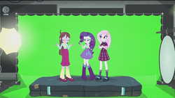 Size: 1279x720 | Tagged: safe, screencap, fleur-de-lis, rarity, velvet sky, equestria girls, friendship games bloopers, g4, my little pony equestria girls: friendship games, airbag, boots, bowtie, bracelet, clothes, crossed arms, crystal prep academy uniform, eyes closed, green screen, high heel boots, high heels, jewelry, mary janes, mirror, pleated skirt, scarf, school uniform, shoes, simple background, skirt, socks, spotlight