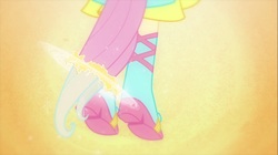 Size: 1100x618 | Tagged: safe, screencap, fluttershy, equestria girls, g4, my little pony equestria girls, abstract background, boots, clothes, dress, fall formal outfits, high heel boots, legs, pictures of legs, ponied up, ponytail, solo, transformation, transformation sequence
