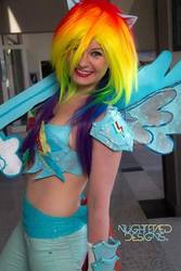 Size: 480x720 | Tagged: safe, artist:badwolfwilliams, rainbow dash, human, g4, armor, clothes, cosplay, costume, gauntlet, irl, irl human, midriff, photo, solo, sword, unconvincing armor, weapon