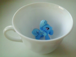 Size: 2048x1536 | Tagged: safe, artist:lixthefork, trixie, pony, g4, blind bag, cup, cup of pony, female, irl, micro, photo, teacup, teaxie, that pony sure does love teacups, toy
