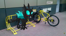 Size: 1280x714 | Tagged: safe, artist:waffleberry, changeling, pony, adorable distress, ambiguous gender, bicycle, bike lock, blushing, cute, cuteling, embarrassed, irl, lock, parking, photo, ponies in real life, solo, stuck, trapped, wide eyes