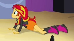 Size: 335x189 | Tagged: safe, screencap, sunset shimmer, equestria girls, g4, my little pony equestria girls: rainbow rocks, boots, clothes, cropped, female, high heel boots, jacket, leather jacket, prone, skirt, solo