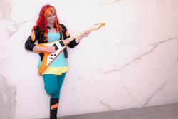 Size: 5330x3553 | Tagged: safe, artist:maddymoiselle, sunset shimmer, human, equestria girls, g4, my little pony equestria girls: rainbow rocks, absurd resolution, babscon, babscon 2017, boots, clothes, cosplay, costume, flying v, guitar, irl, irl human, musical instrument, photo, photography, smiling, solo, sunset shredder
