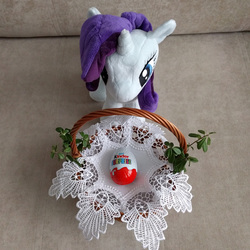 Size: 1600x1600 | Tagged: safe, rarity, pony, g4, 4de, basket, chocolate, doily, easter, food, holiday, irl, kinder egg, leaves, photo, plushie, rarity looking at food, solo, toy