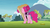 Size: 1366x768 | Tagged: safe, screencap, pinkie pie, earth pony, pony, g4, my little pony: friendship is magic, rock solid friendship, alternate hairstyle, balloonbutt, bun, butt, discovery family logo, female, hairnet, mare, pizza delivery, pizza head, plot, ponyville, solo