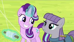 Size: 1366x768 | Tagged: safe, screencap, maud pie, starlight glimmer, earth pony, pony, g4, rock solid friendship, discovery family logo, glowing horn, happy, horn, kite, kite flying, magic, smiling, telekinesis