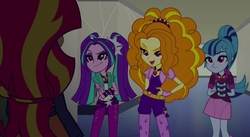 Size: 1024x562 | Tagged: safe, screencap, adagio dazzle, aria blaze, sonata dusk, sunset shimmer, equestria girls, g4, my little pony equestria girls: rainbow rocks, smiling, the dazzlings