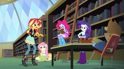 Size: 1100x618 | Tagged: safe, angel bunny, applejack, fluttershy, pinkie pie, rarity, sunset shimmer, equestria girls, g4, my little pony equestria girls: friendship games, backpack, book, boots, bracelet, chair, clothes, cowboy boots, cowboy hat, denim skirt, hands behind back, hat, high heel boots, jacket, jewelry, ladder, leather jacket, library, rear view, skirt, stetson, table