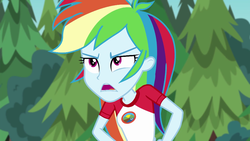 Size: 1280x720 | Tagged: safe, screencap, rainbow dash, equestria girls, g4, my little pony equestria girls: legend of everfree, camp everfree outfits, clothes, female, hand on hip, open mouth, tree