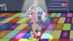 Size: 1600x900 | Tagged: safe, screencap, fluttershy, sugarcoat, dance magic, equestria girls, equestria girls specials, g4, ballet slippers, clothes, converse, dance magic (song), duo, female, ponied up, pose, shoes, skirt, sneakers, socks, teletoon