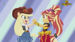 Size: 1150x645 | Tagged: safe, screencap, applejack, sunset shimmer, equestria girls, equestria girls specials, g4, my little pony equestria girls: dance magic, clothes, cowboy hat, dancing, dress, hat, holding hands, looking at each other, ponied up