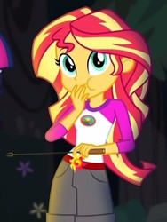 Size: 354x472 | Tagged: safe, screencap, sci-twi, sunset shimmer, twilight sparkle, equestria girls, g4, my little pony equestria girls: legend of everfree, camp everfree outfits, clothes, cropped, cute, eating, female, flower, looking at you, offscreen character, puffy cheeks, shimmerbetes, shorts, solo, sun, tree