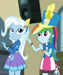 Size: 346x410 | Tagged: safe, screencap, rainbow dash, trixie, velvet sky, equestria girls, g4, my little pony equestria girls: friendship games, chs rally song, clothes, cropped, door, female, hat, jacket, pony ears, scarf, wondercolt ears, wristband