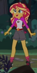 Size: 237x472 | Tagged: safe, screencap, sunset shimmer, equestria girls, g4, my little pony equestria girls: legend of everfree, boots, camp everfree outfits, clothes, cropped, cute, female, flower, legs, shimmerbetes, shorts, socks, solo, sun, tree