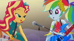 Size: 1100x618 | Tagged: safe, screencap, rainbow dash, sunset shimmer, equestria girls, g4, my little pony equestria girls: legend of everfree, crystal gala, electric guitar, female, flying v, guitar, legend you were meant to be, lidded eyes, looking at each other, microphone, musical instrument, sunset shredder