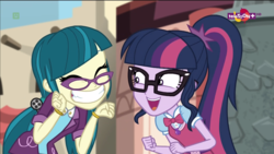 Size: 1600x900 | Tagged: safe, screencap, juniper montage, sci-twi, twilight sparkle, equestria girls, movie magic, spoiler:eqg specials, ^^, adorkable, baubles, blazer, bracelet, clothes, cute, cute little fangs, dork, eyes closed, fangs, female, geode of telekinesis, glasses, grin, hair tie, happy, india movie set, jewelry, junibetes, magical geodes, necktie, open mouth, pigtails, ponytail, poofy shoulders, shirt, smiling, squee, standing, sweater vest, teletoon, twiabetes, twintails