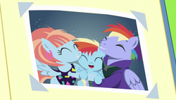 Size: 1920x1090 | Tagged: safe, screencap, bow hothoof, rainbow dash, windy whistles, pegasus, pony, g4, parental glideance, baby, baby dash, baby pony, clothes, cute, dashabetes, eyes closed, female, filly, filly rainbow dash, happy, hug, male, mare, photo, rainbow dash's parents, smiling, spread wings, stallion, wings, younger