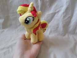 Size: 4608x3456 | Tagged: safe, artist:shadowkrafts, sunset shimmer, pony, unicorn, g4, high res, in goliath's palm, irl, photo, plushie, solo