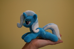 Size: 3008x2000 | Tagged: safe, artist:lanacraft, trixie, human, pony, unicorn, g4, hand, high res, in goliath's palm, irl, kittensized, lidded eyes, photo, plushie, prone, smiling